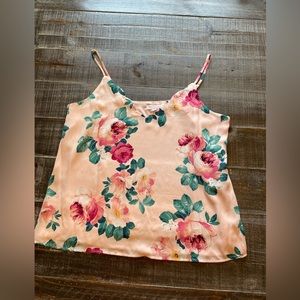 Pink floral camisole top with scalloped edges.